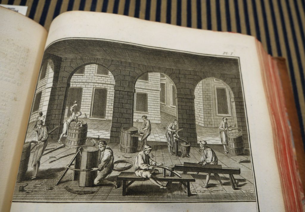 Plate depicting workers making stringed instruments