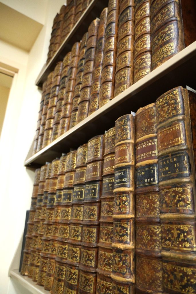 Shelves containing volumes of Diderot's Encyclopedia