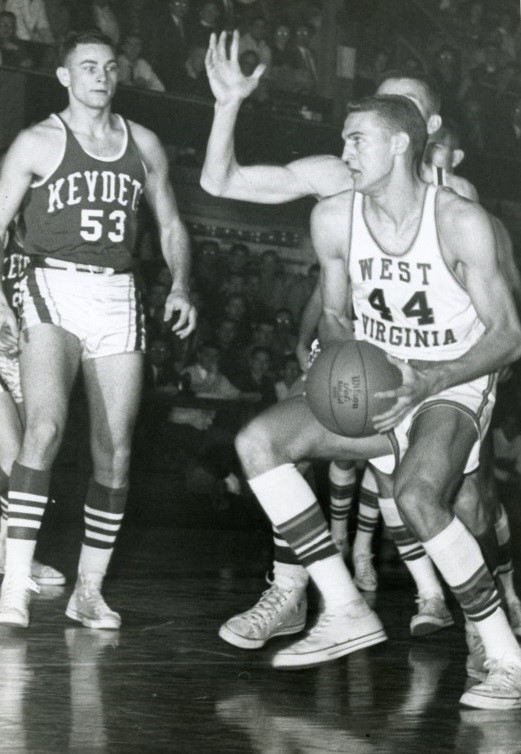 Action shot of Jerry West playing WVU basketball