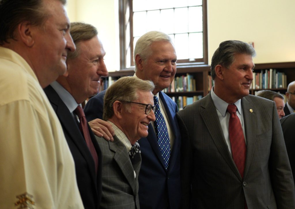 Group photo of Bob Huggins, Rod Thorn, President Gee, Jerry West, and Senator Joe Manchin