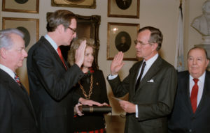  Vice President George H. W. Bush administering oath to Senator John D. (Jay) Rockefeller. Rockefeller is joined by his wife, Sharon, Senator Robert C. Byrd and former Senator Jennings Randolph, whom he succeeded. Senate Photographic Studio, January 15, 1985.