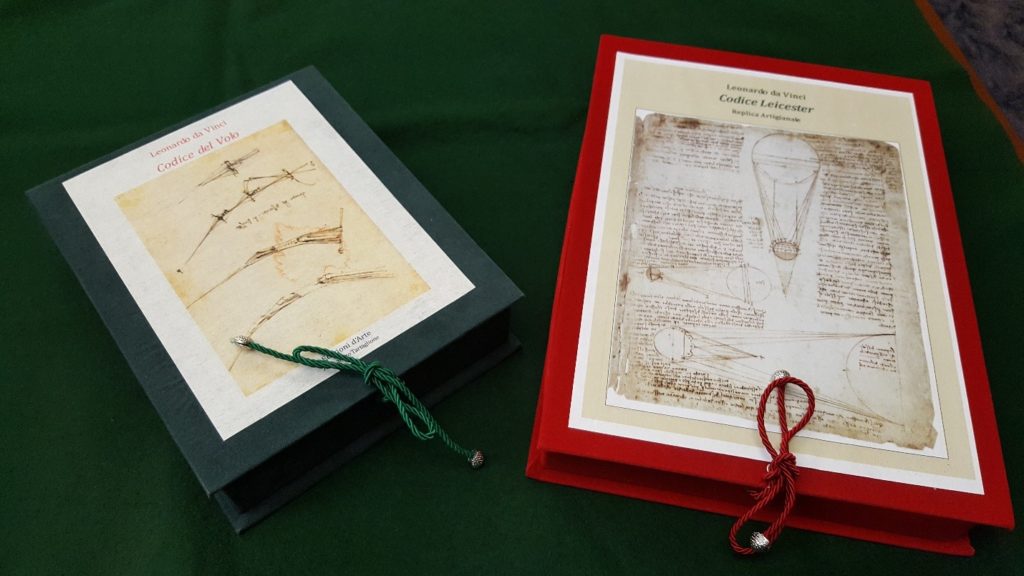 Replicas of The Codice Leicester and Codice del Volo in their protective boxes