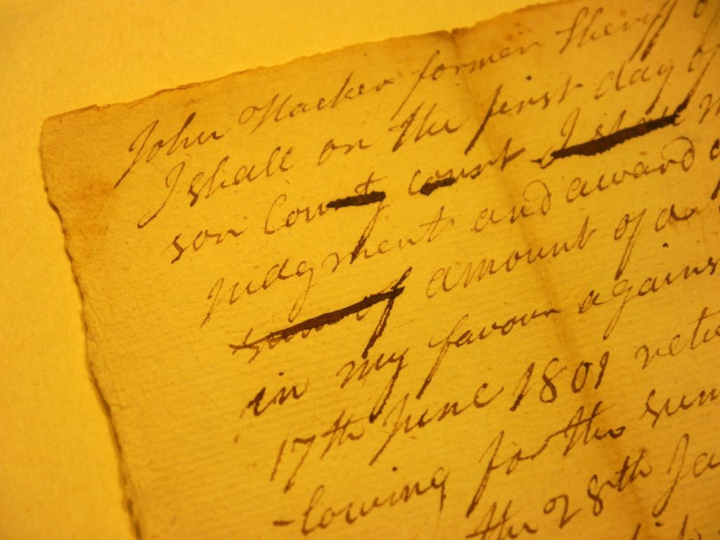 Detail of Handwritten Court Record Featuring Name of Pioneer John Hacker, Referencing Him as "Former Sheriff", 1809