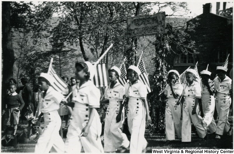 Storer College students marching in military style uniforms