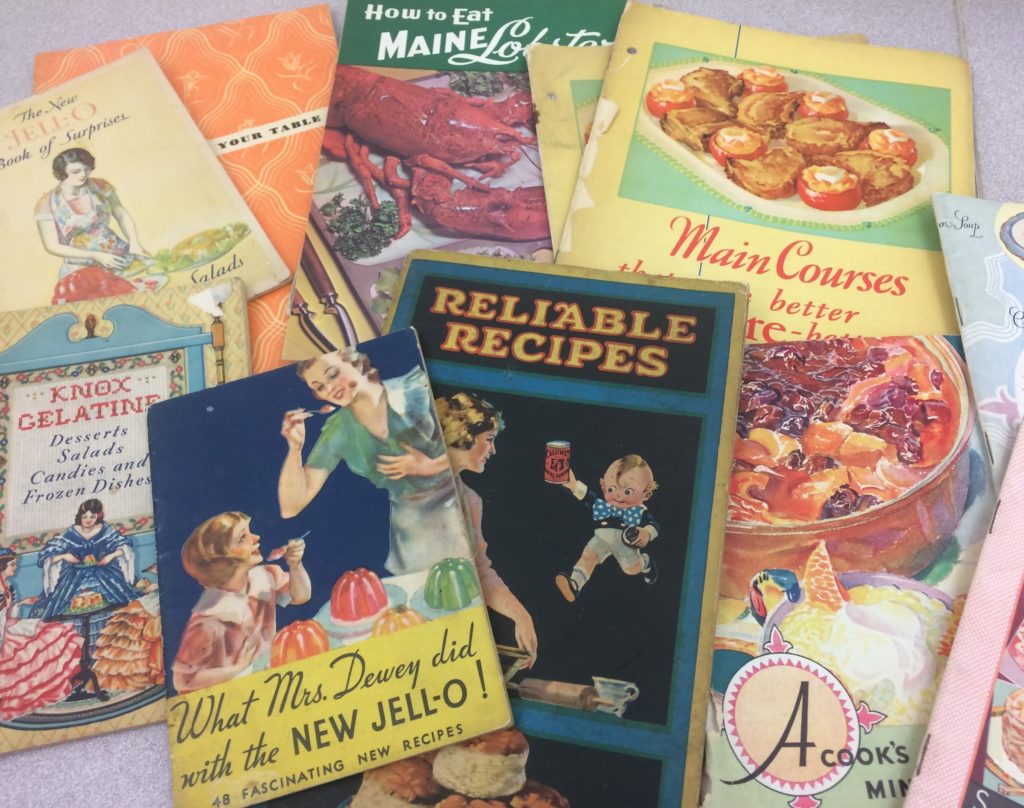 Colorful assortment of old cooking pamphlets