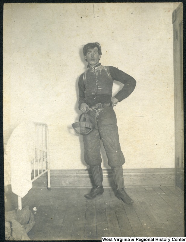 WVU student in pre-1900 footlball gear