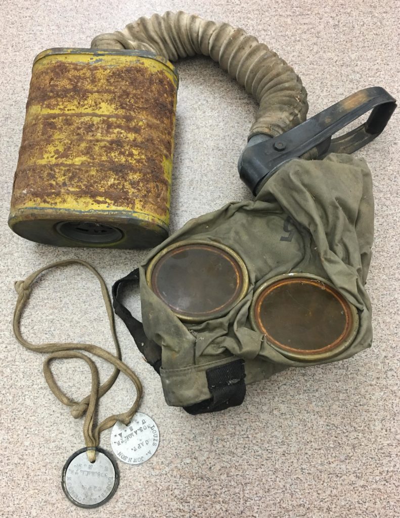 Gas Mask and Tags belonging to Louis A. Johnson, ca. 1918