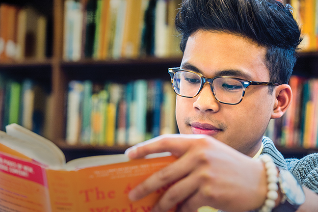 student reading a book