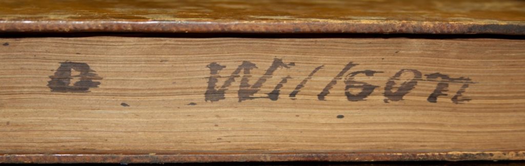 "A Willson" written on a book's fore edge