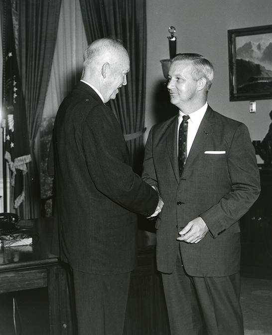 Arch Moore shakes hands with President Eisenhower