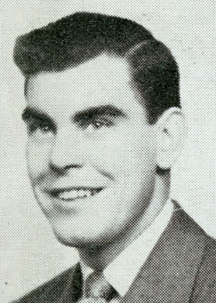 Black and white headshot-style portrait of a young man