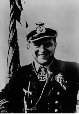 Portrait of a smiling Albrecht Brandi in uniform.