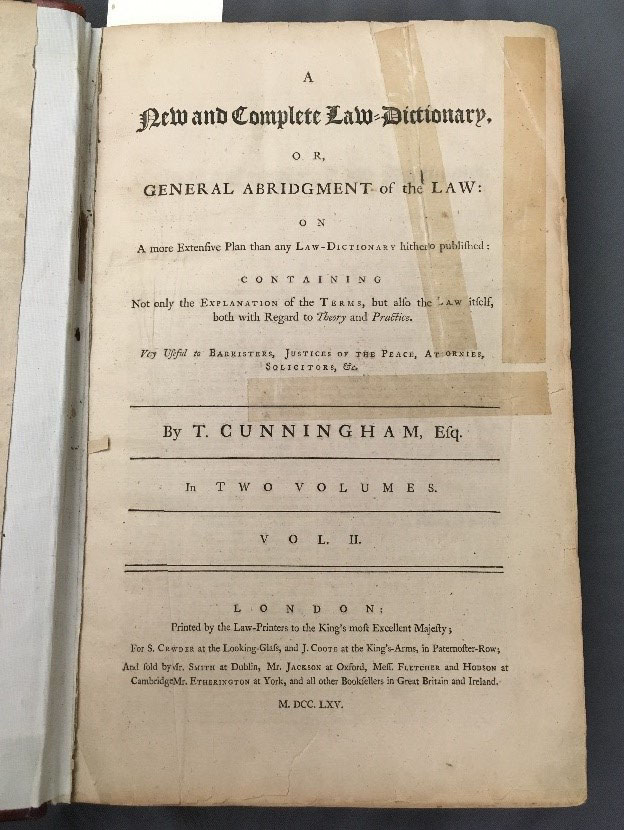 Title page of "A New and Complete Law Dictionary" from 1765, repaired with tape