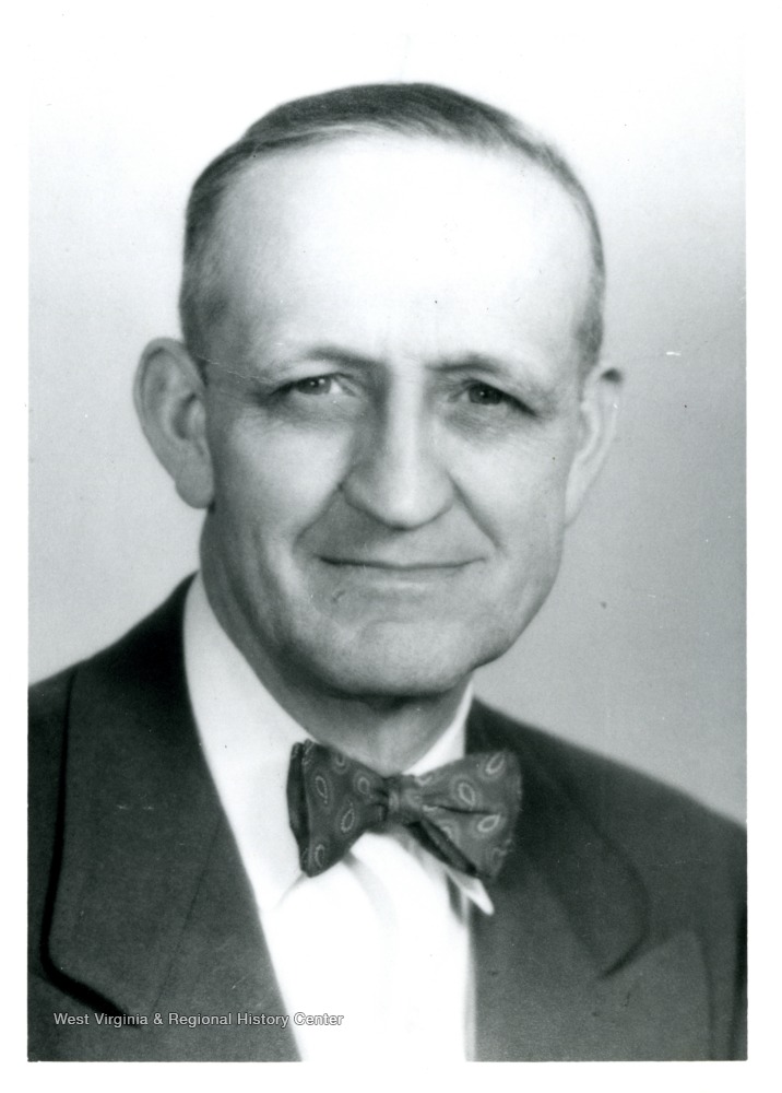 Portrait photo of Harry Stansbury in a bow tie