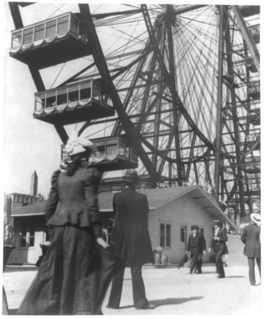 View of the world's first Ferris Wheel from the ground, showing a few of the cars.