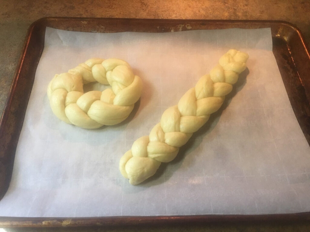 Ring and loaf of unbaked, braided dough