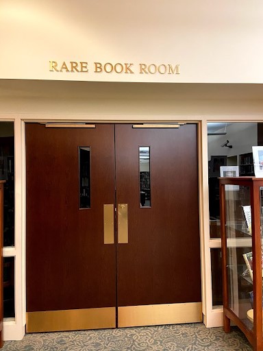 Double doors with sign above that reads "Rare Book Room"