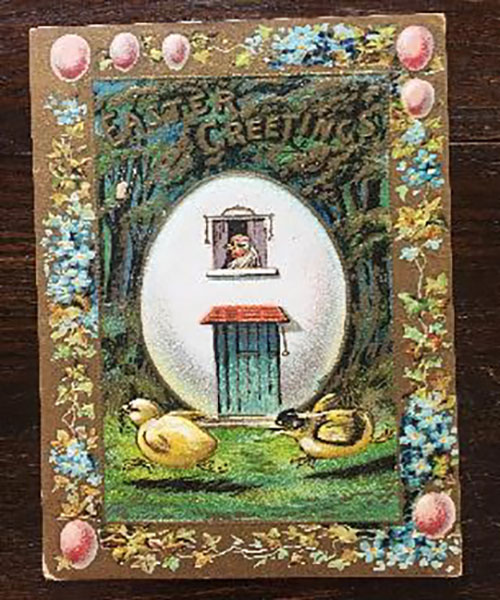 Easter postcard showing hen in an egg house, watching her chicks play in the yard