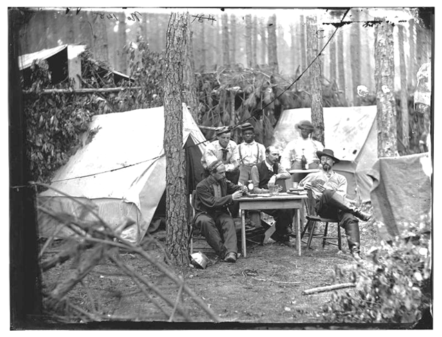 At an encampment at Petersburg, Virginia, soldiers of the 114th Pennsylvania Infantry play cards in front of their tents during the Civil War.” Anchor: A North Carolina History Online Resource